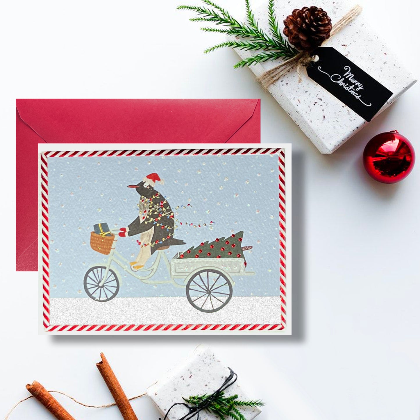 Penguin Riding in Snow Christmas Card